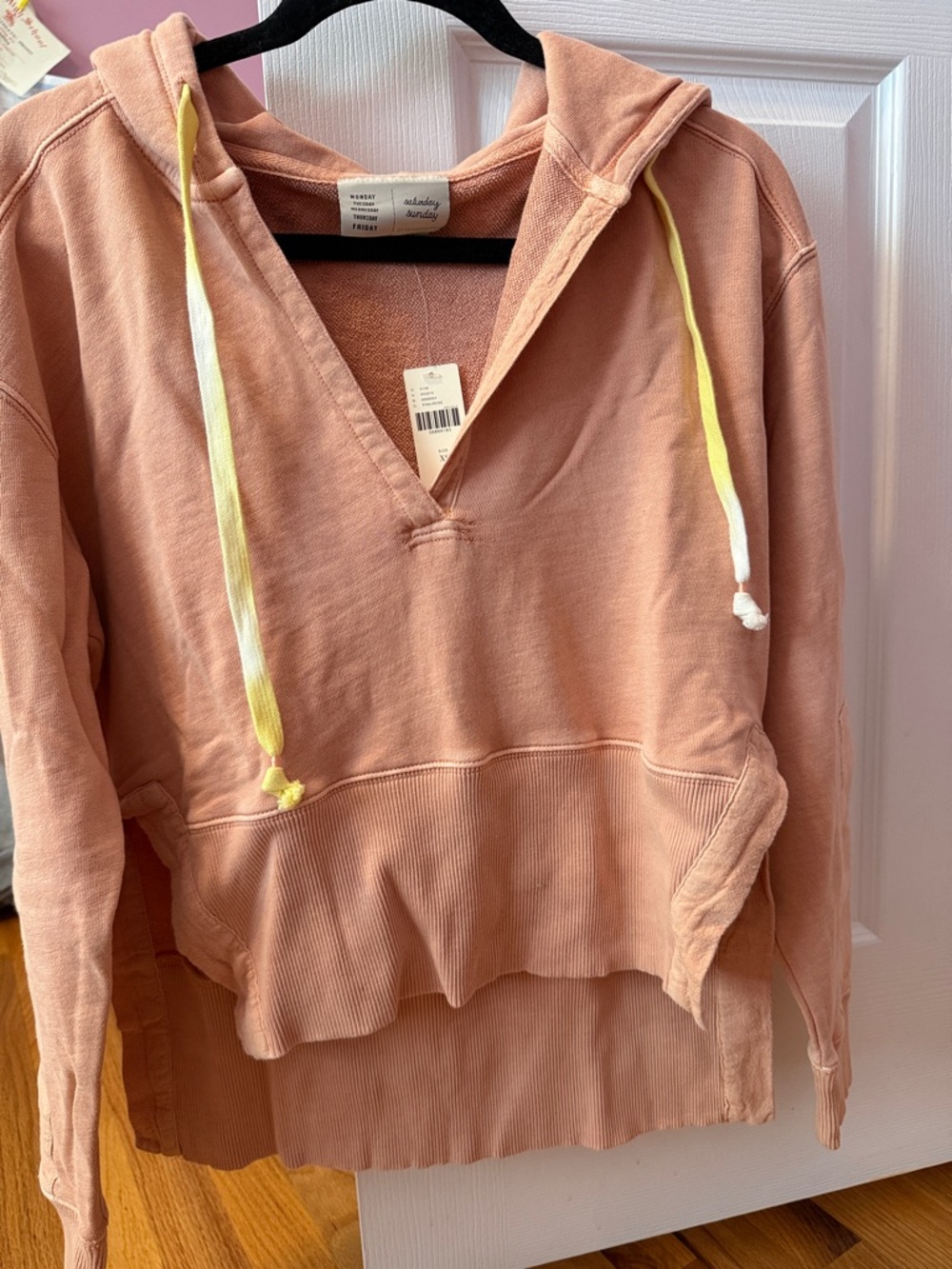 Anthropologie Peach Blush V‑Neck Hoodie with Yellow Drawstrings